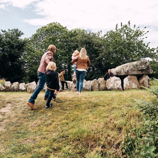 Faldouet Dolmen group walk towards the dolmen