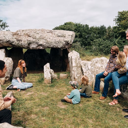 Faldouet Dolmen Group listen to a talk from Jersey Heritage