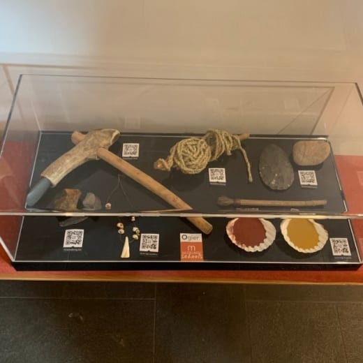 Replica neolithic items from a display case for schools