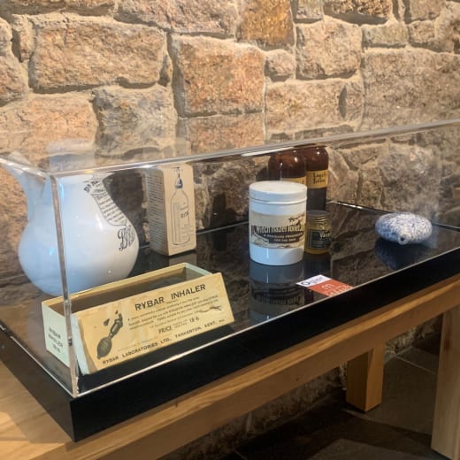 Display case with historic items relating to health