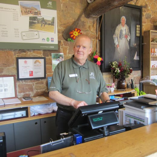 Man stands at a till