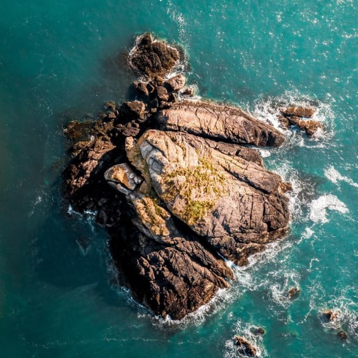 Ignimbrite rock formation in the sea