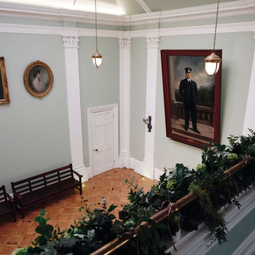 A hallway with paitings