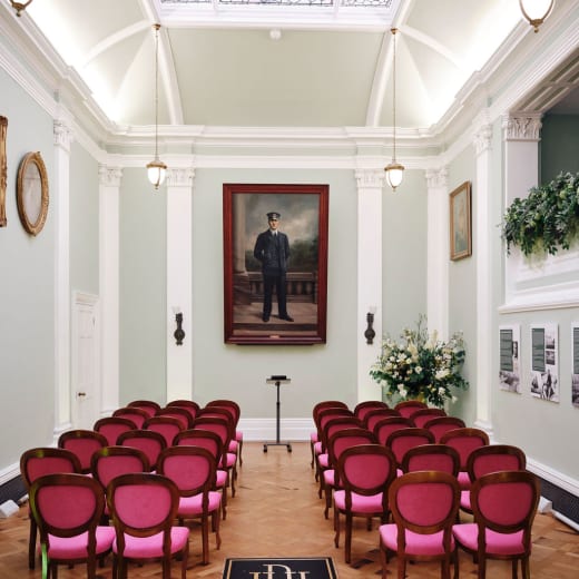 Read seating in a white room