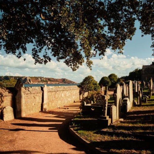 A churchyard with grave stones