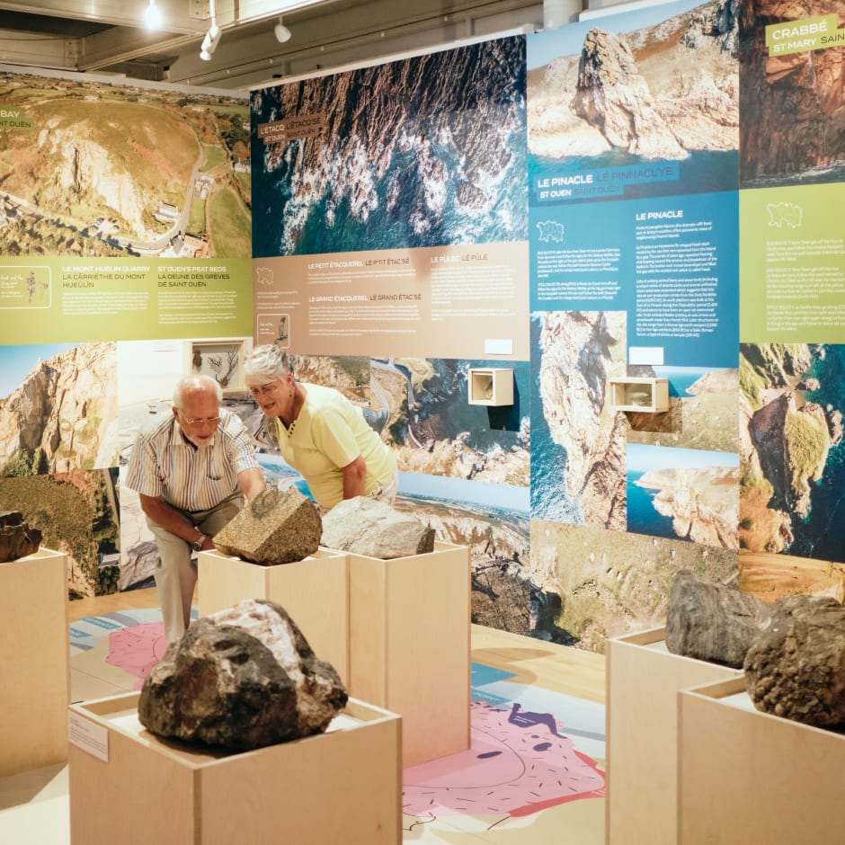 Jersey Museum couple look at geopark exhibition
