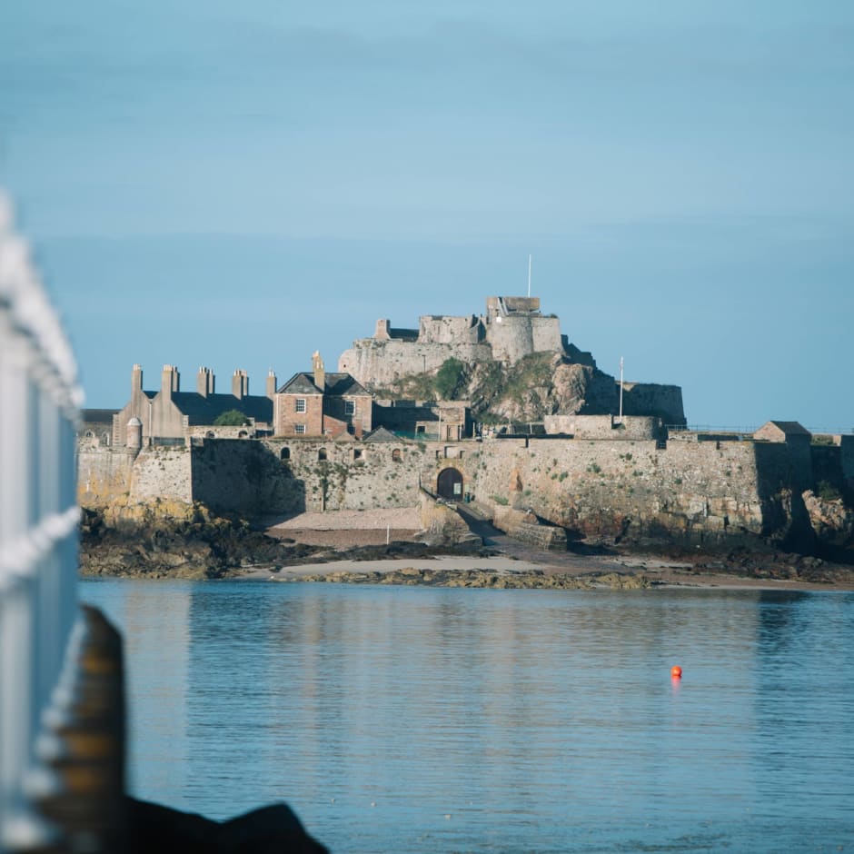 A castle sitting in a bay