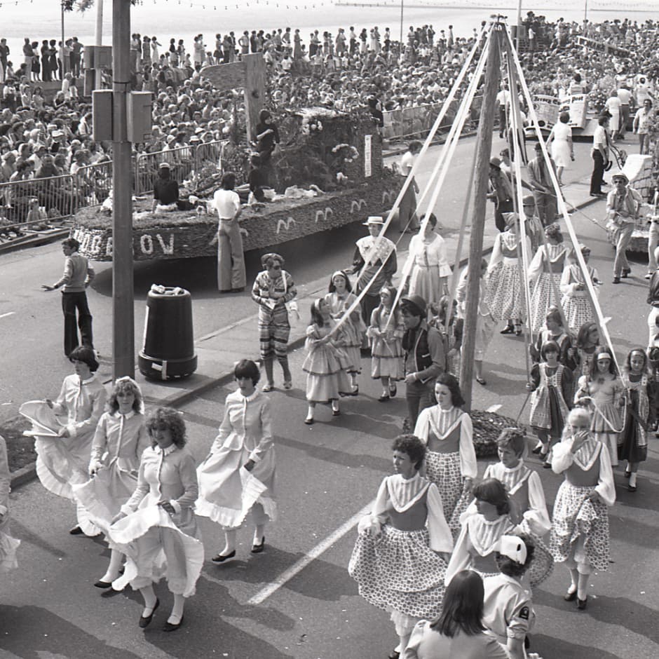 Black and white photo of a parade