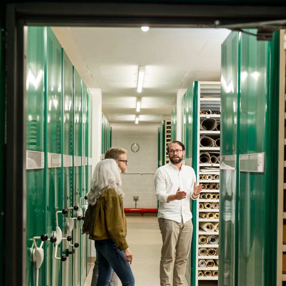 Couple taking a tour of the Jersey Archive