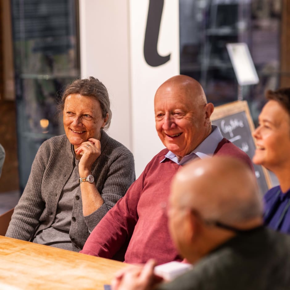 a group of people smiling