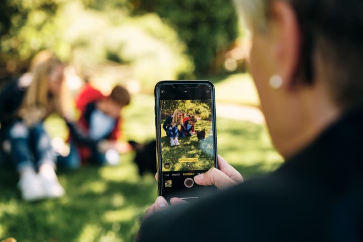 Photo taken of family having a picnic