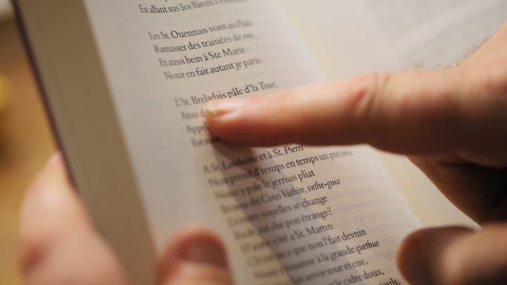 Finger on a text book