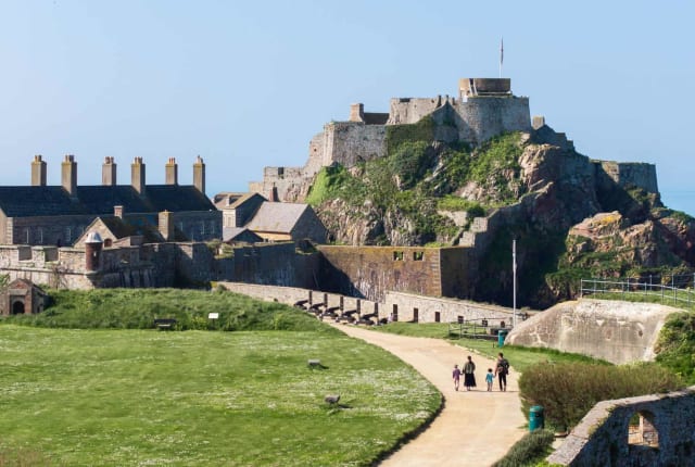 Family walking toward Elizabeth Castle