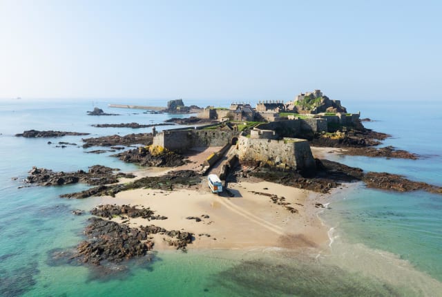A castle surrounded by sea