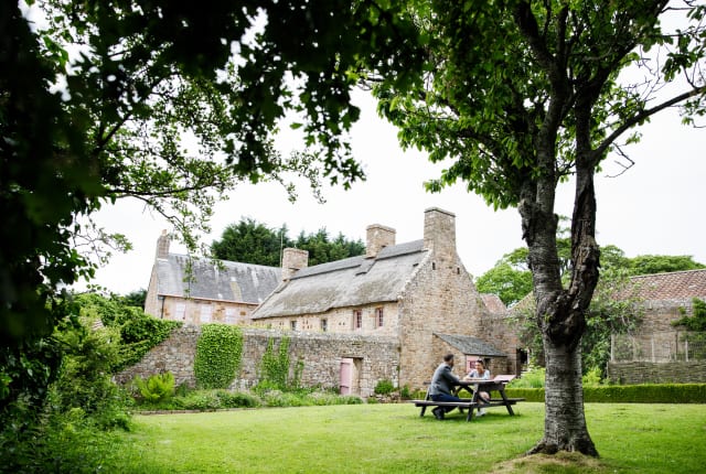 A country house in a field