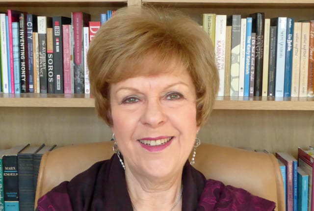 A woman with purple scarf