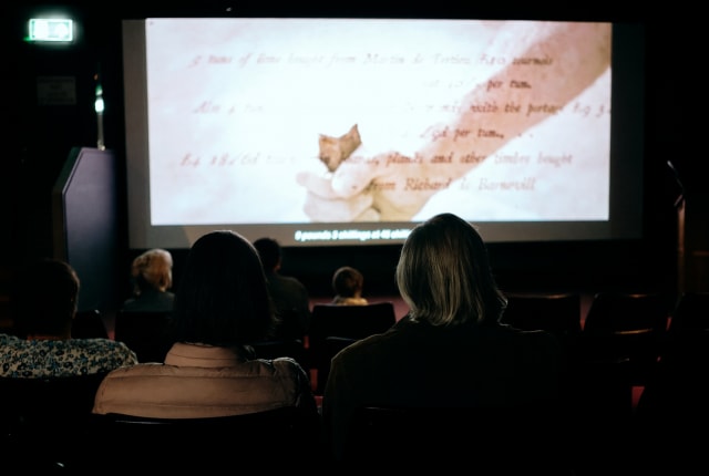 People watching a film