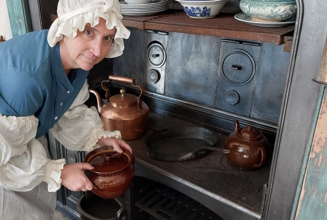 Woman dressed as Victorian Kitchen Cook