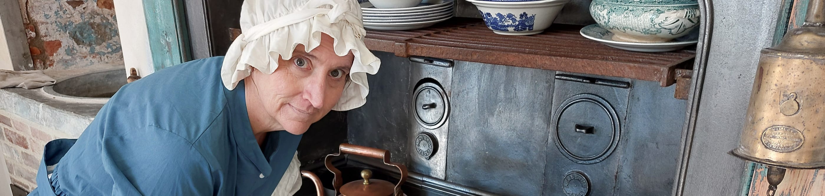 Woman dressed as Victorian Kitchen Cook