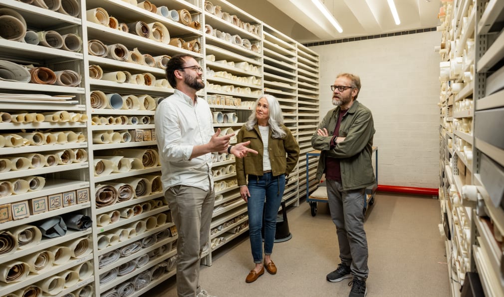 People take a tour of an archive facility