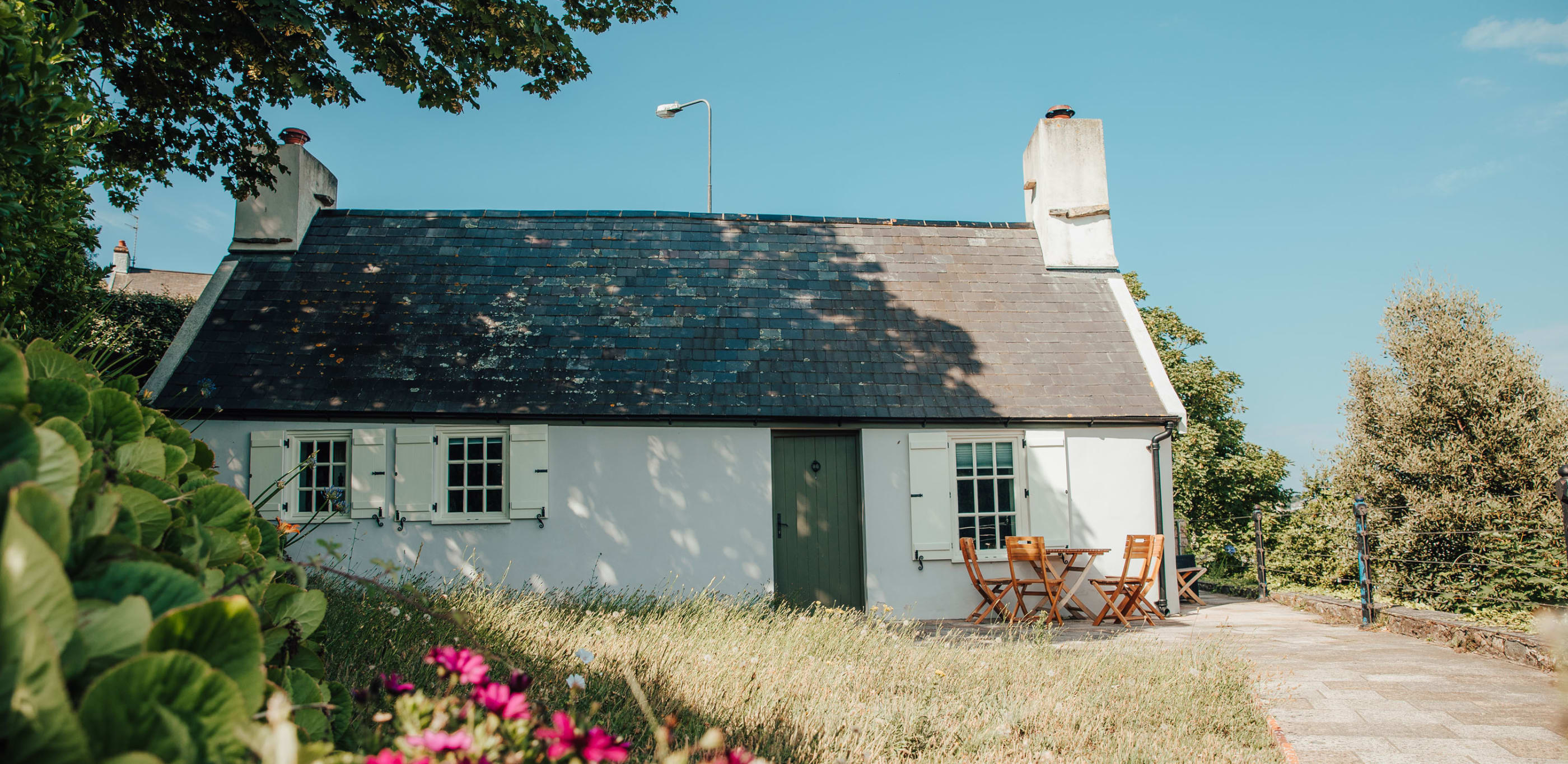 Fishermans Cottage Exterior with Flowers in foreground