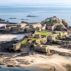 Landscape of Elizabeth Castle fortress with sea surrounding the footprint of the castle