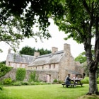 A country house in a field