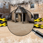 A magnifying glass and crime scene mock up