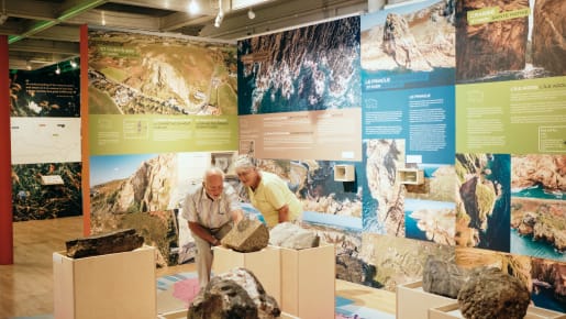 Jersey Museum couple look at geopark exhibition