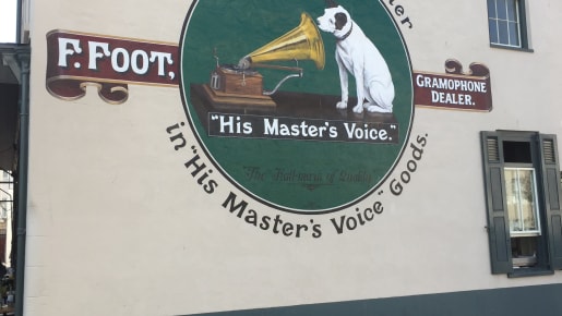 Old HMV sign painted on a wall