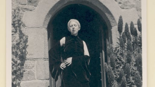 Self portrait (in velvet dress, at La Rocquaise) of Claude Cahun