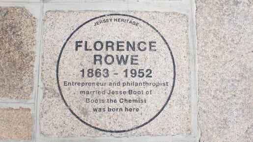 A plaque set in wall to mark Florence Rowe