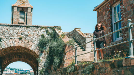 Man stands by entrance to Elizabeth Castle