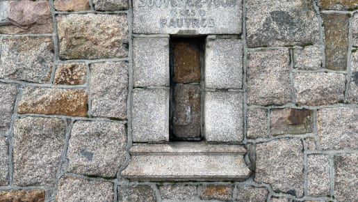 A poor box in a wall