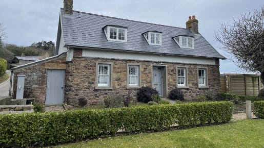 A typical Jersey cottage with Jersey granite