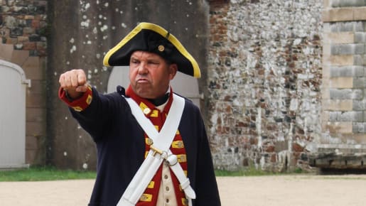 A man in old fashioned military uniform