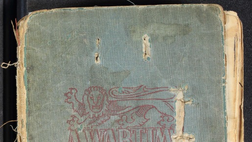 a well worn blue scrapbook