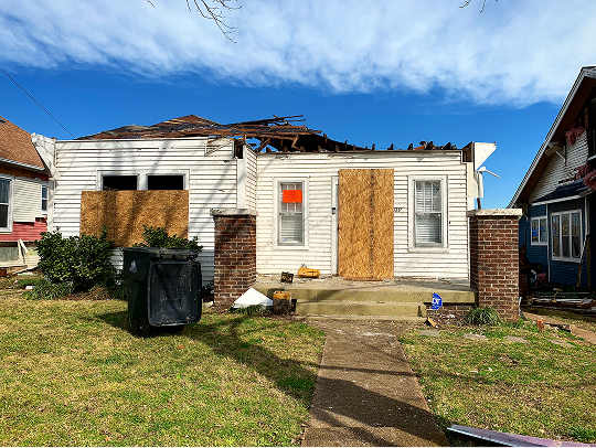 Jeff's house with its roof torn off after the tornado