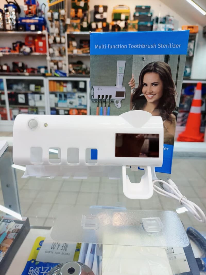 DISPENSADOR DE PASTA DENTAL 1