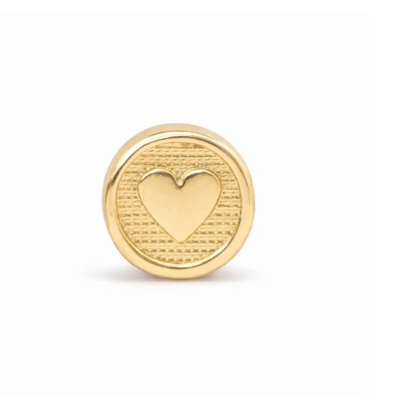 Herrajes en oro laminado 18k 23