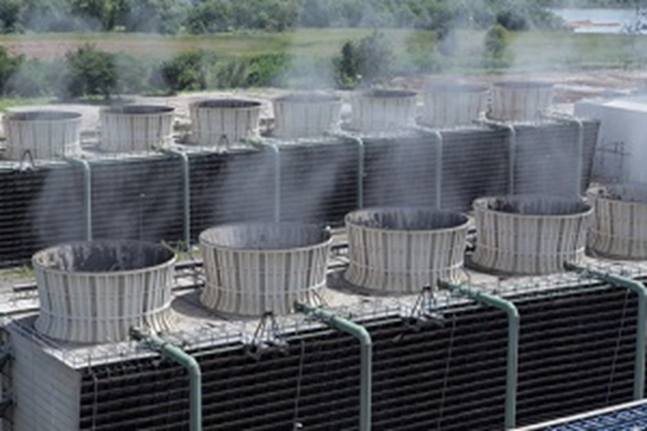 Evaporative cooling towers at a data center that consume freshwater to keep AI servers cool