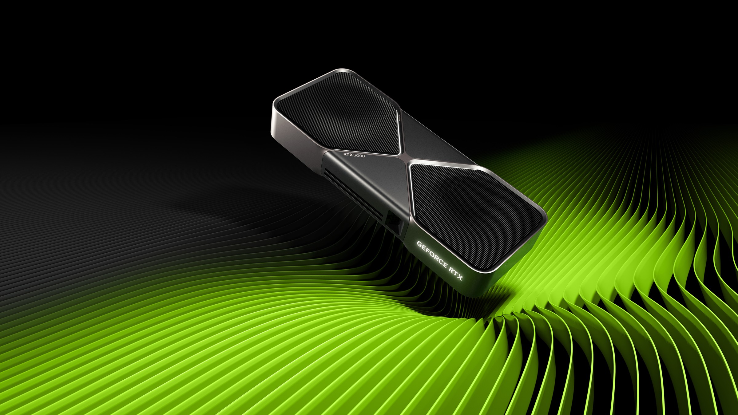 Official NVIDIA render of the GeForce RTX 5090 Founders Edition graphics card, a dark grey card with a silver X-shaped frame, two fans and RTX 5090 and GeForce RTX lettering, tilted above bright green wave shapes on a black background