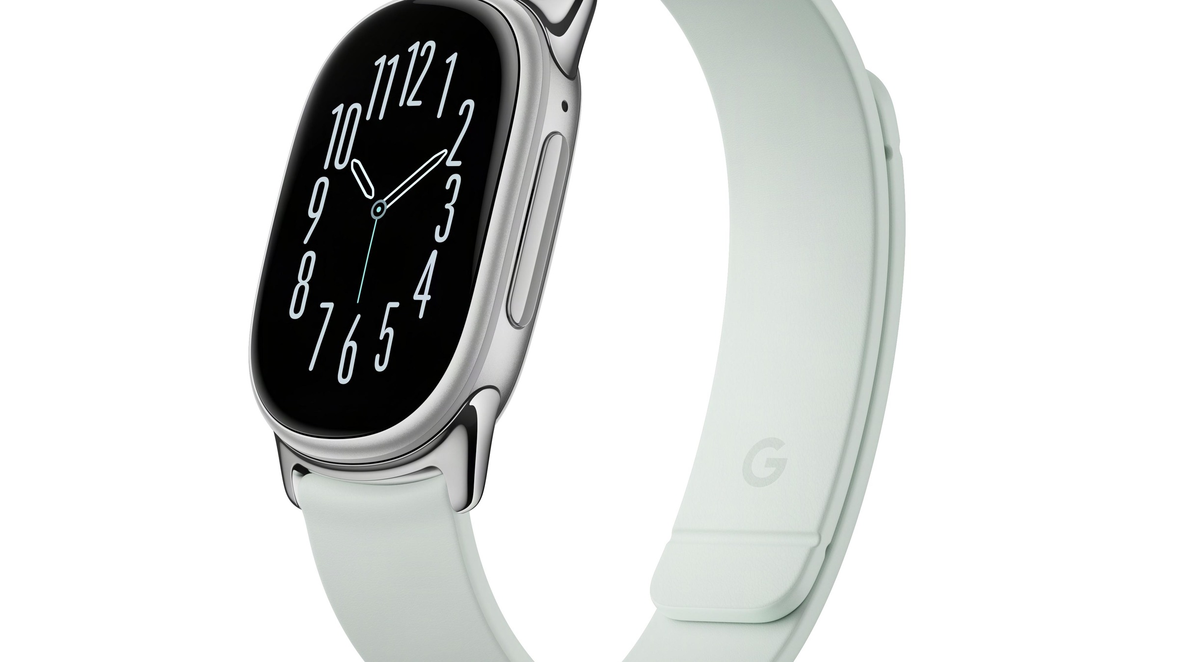 Official Google press render of the Fitbit Edge in Fog polished silver with a light mint Magnet Band, showing the tall pill-shaped OLED screen with an analog clock face and a side button, on a white background