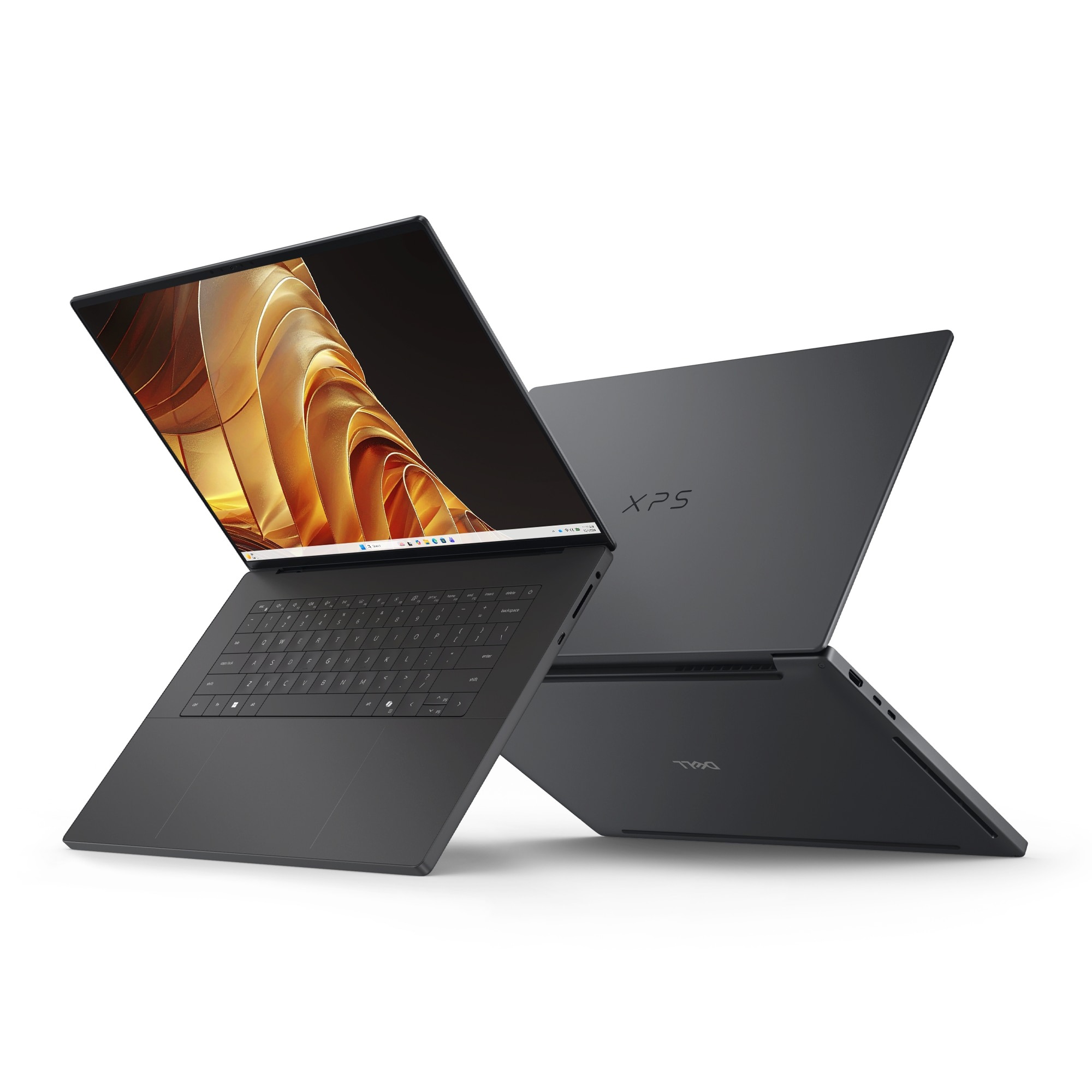 Two Dell XPS 16 Creator Edition laptops in graphite, one open showing a gold abstract wallpaper and one closed showing the XPS logo on the lid