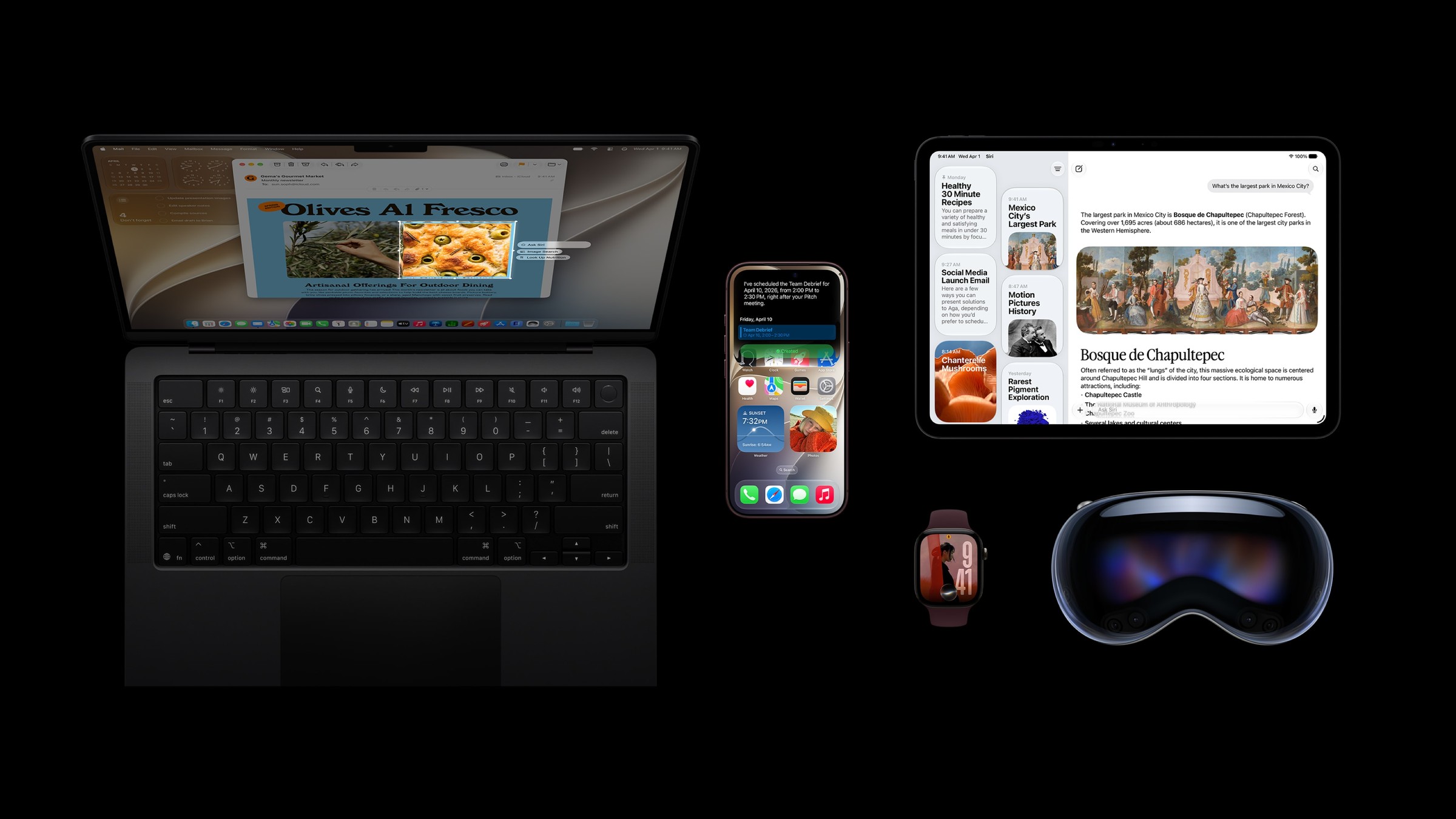 A dark MacBook Pro, iPhone, iPad, Apple Watch and Apple Vision Pro arranged on a black background, each showing Apple's latest software