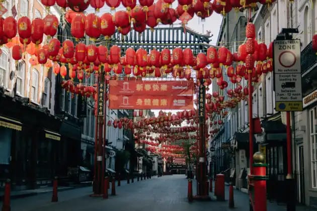 Chinatown London on Gerrard Street with red lanterns and decorative gates