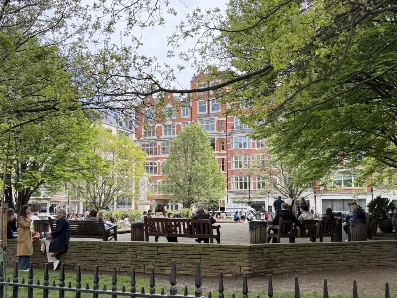 Golden Square garden in Soho London with the 1753 statue of George II