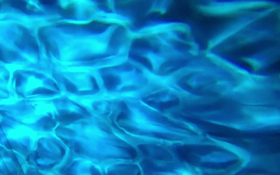 Real close-up photo of blue silk-water texture projection