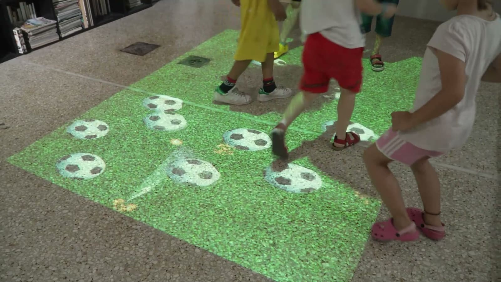 Infinity All-In-One Interactive Projector — real install, library in Greece (kids playing interactive floor games)