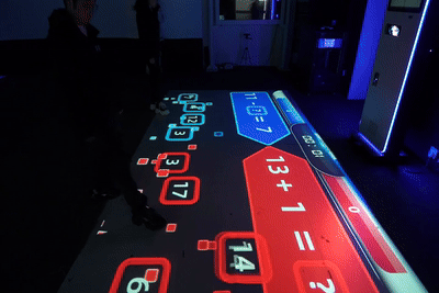 Infinity GamePlay360 Interactive Floor Projector — interactive projector in use